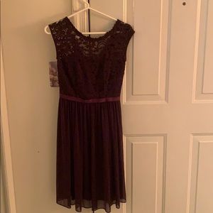 A purple lace dress purchased from David’s bridal